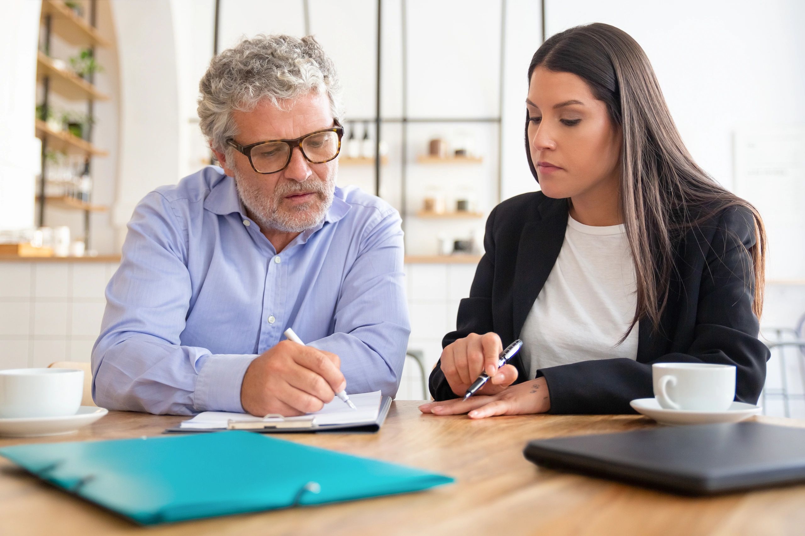 Client reviewing property documents with an advisor
