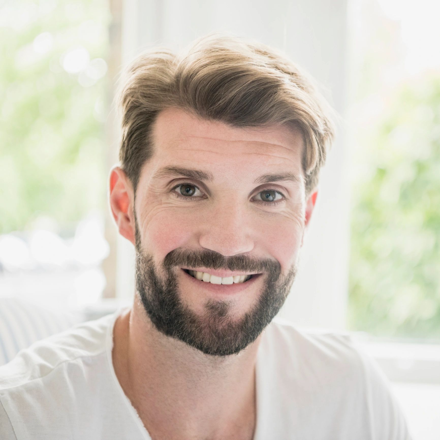 Portrait of satisfied client smiling